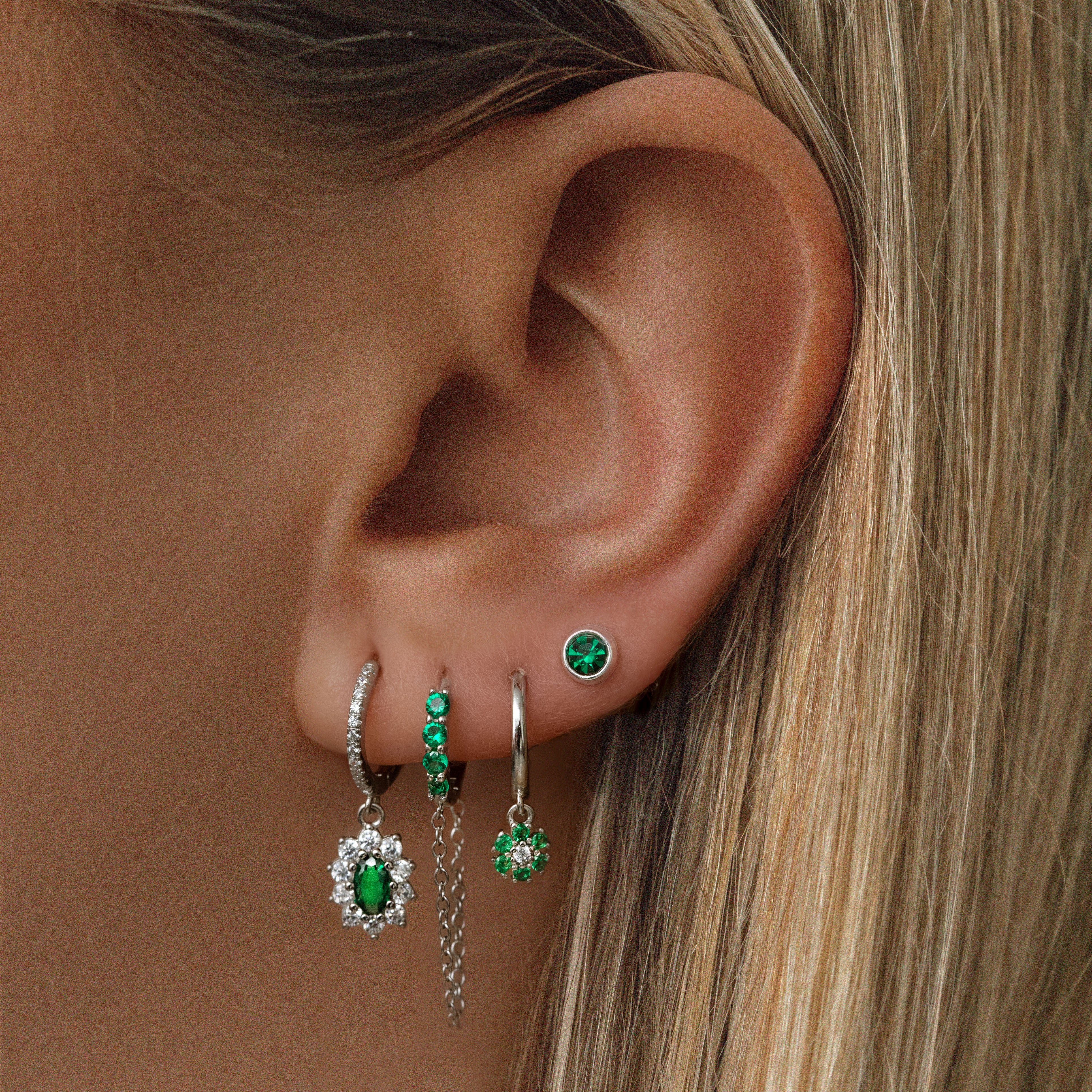 Sterling silver cubic zirconia detailing earring with drop down flower design in silver and green. Adrianna hoop earrings- Lephoria