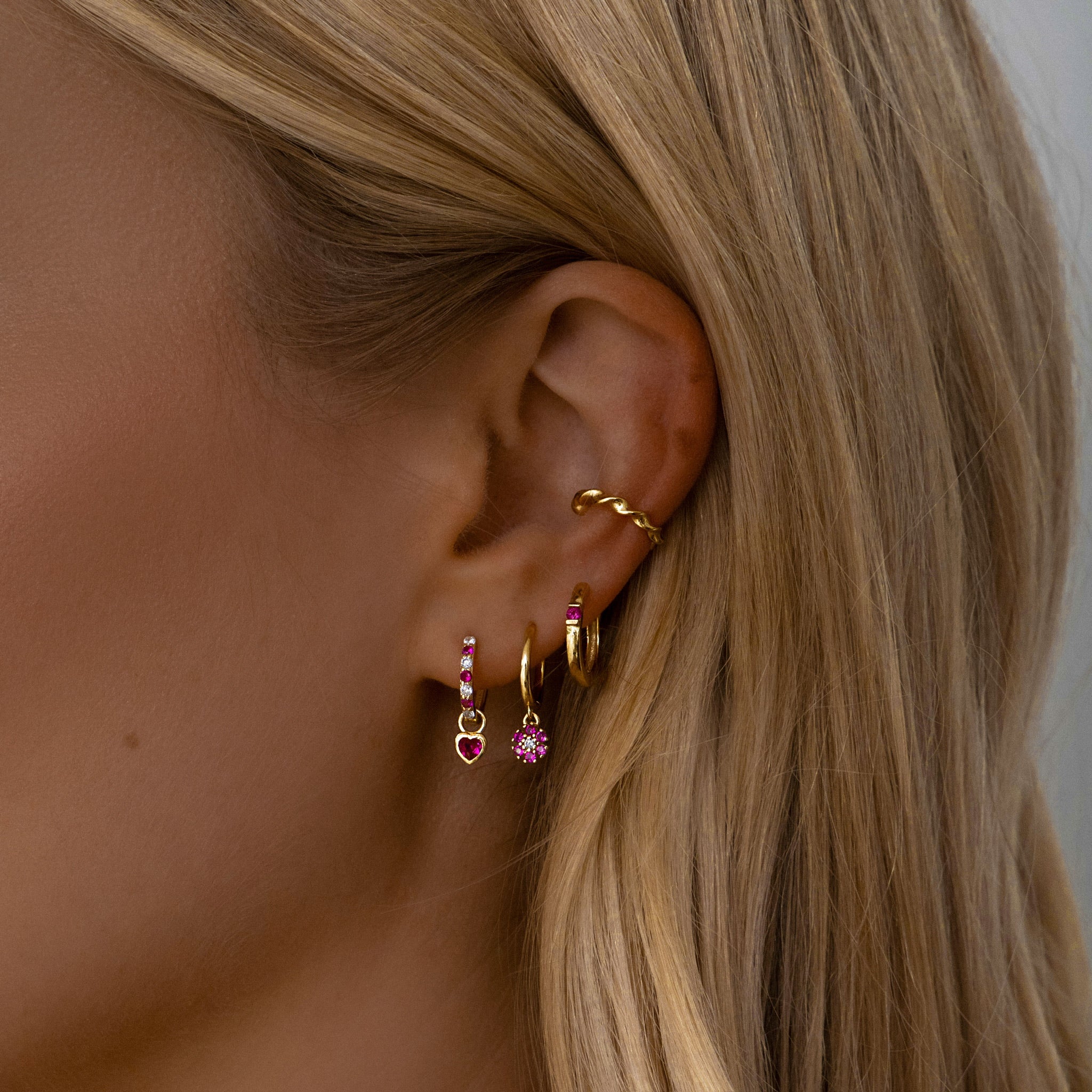 Sterling silver cubic zirconia detailing earring with drop down flower design in gold and pink. Adrianna hoop earrings- Lephoria