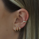 Sterling silver hoops in gold with a diamond shape cubic zirconia and smaller cubic zirconia detailing. Alexia hoop earrings- Lephoria 