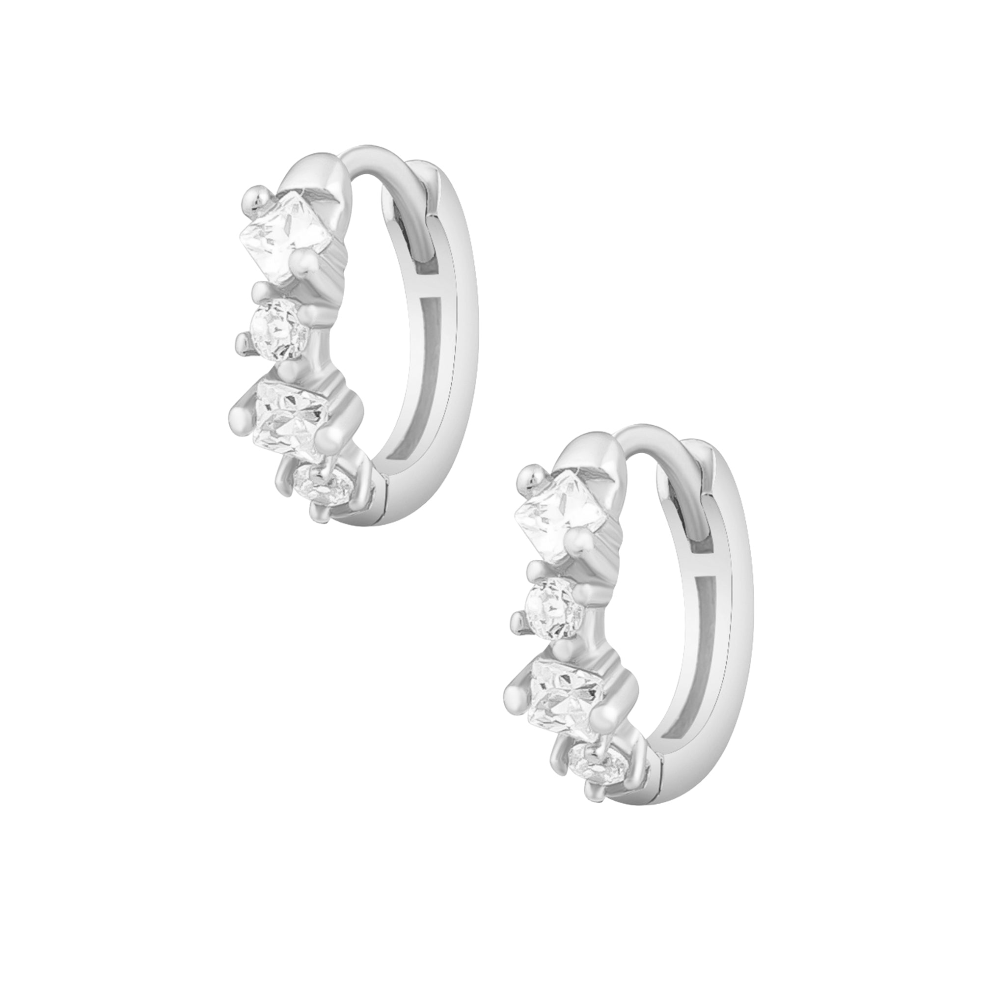 Sterling silver hoops with different size cubic zirconia detailing. Alcudia hoop earrings- Lephoria 